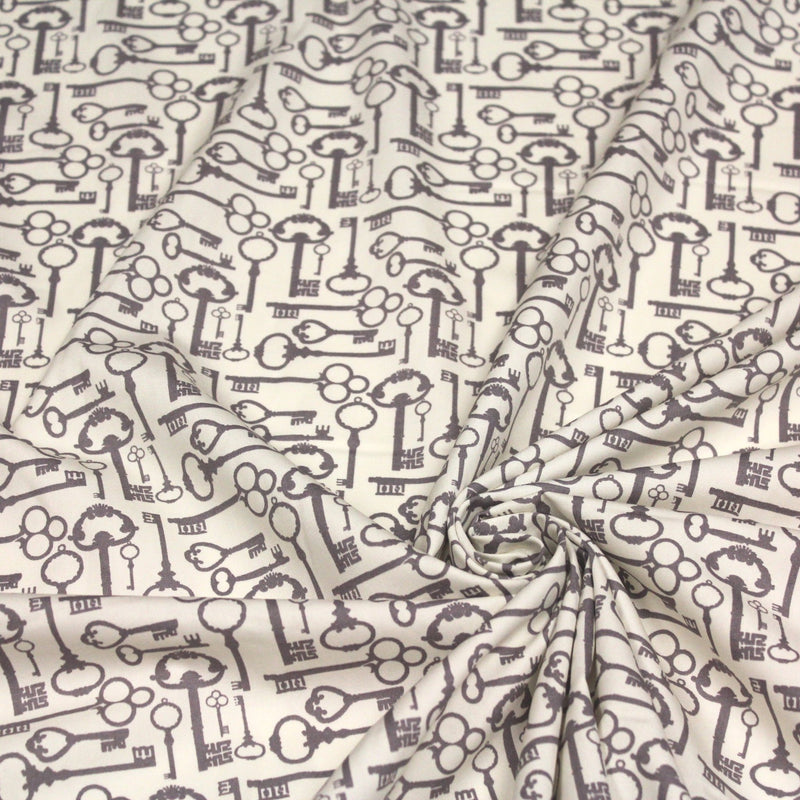 Tissu popeline de coton aux clefs vintage taupe, fond écru - TissusPapi.com