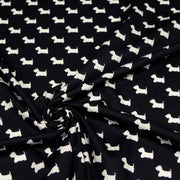 Tissu popeline de coton aux petits chiens blancs, fond noir - TissusPapi.com