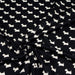 Tissu popeline de coton aux petits chiens blancs, fond noir - Oeko-Tex