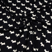 Tissu popeline de coton aux petits chiens blancs, fond noir - TissusPapi.com