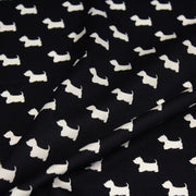 Tissu popeline de coton aux petits chiens blancs, fond noir - TissusPapi.com