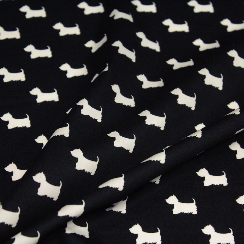 Tissu popeline de coton aux petits chiens blancs, fond noir - TissusPapi.com