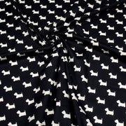 Tissu popeline de coton aux petits chiens blancs, fond noir - TissusPapi.com
