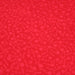 Tissu de coton batik gaufré OCÉANIE aux fleurs et taches rouges clair, fond rouge