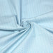 Tissu de coton aux petites lunes blanches, fond bleu ciel - OEKO-TEX®
