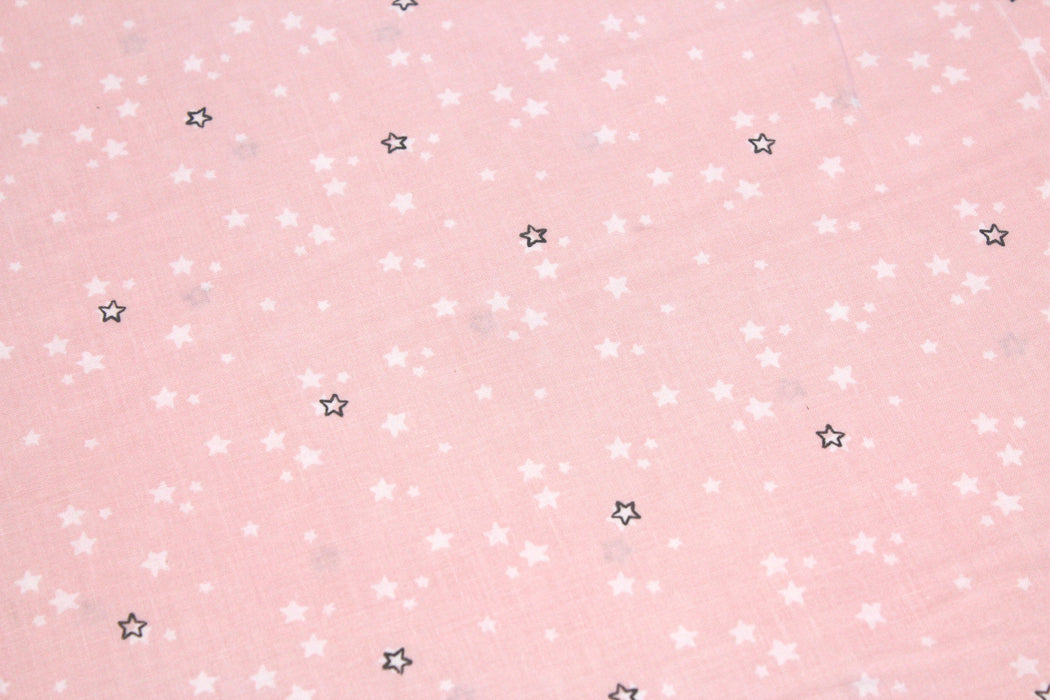 Tissu de coton aux petites étoiles blanches & noires, fond rose pâle - OEKO-TEX®
