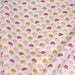 Tissu de coton aux demi-cercles et petits pois roses, jaunes & corail, fond blanc - OEKO-TEX®