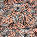 Tissu de coton JAVA aux fleurs & feuilles noires et blanches, fond corail - Oeko-Tex