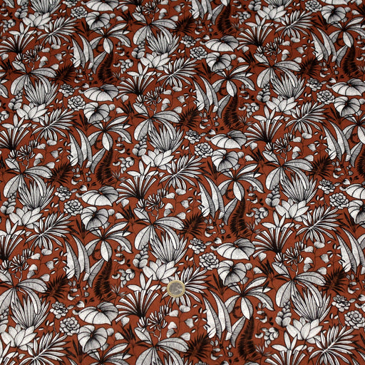 Tissu de coton JAVA aux fleurs & feuilles noires et blanches, fond rouge tomette - Oeko-Tex