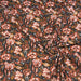 Tissu de coton tropical aux fleurs orange rouille, fond noir - Oeko-Tex - tissuspapi