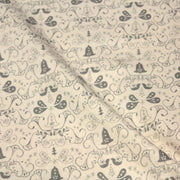 Tissu de coton de Noël scandinave aux cloches & arabesques grises, fond écru - TissusPapi.com