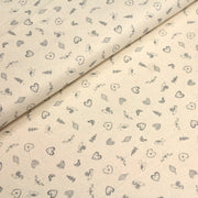 Tissu de coton de Noël scandinave aux petits objets de Noël gris, fond écru - TissusPapi.com