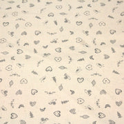 Tissu de coton de Noël scandinave aux petits objets de Noël gris, fond écru - TissusPapi.com