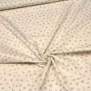 Tissu de coton de Noël scandinave aux petits objets de Noël gris, fond écru - TissusPapi.com