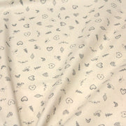 Tissu de coton de Noël scandinave aux petits objets de Noël gris, fond écru - TissusPapi.com