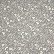Tissu de coton de Noël scandinave aux cloches & arabesques écrues, fond gris - TissusPapi.com