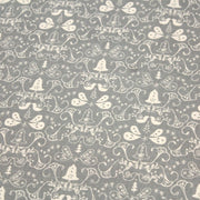 Tissu de coton de Noël scandinave aux cloches & arabesques écrues, fond gris - TissusPapi.com