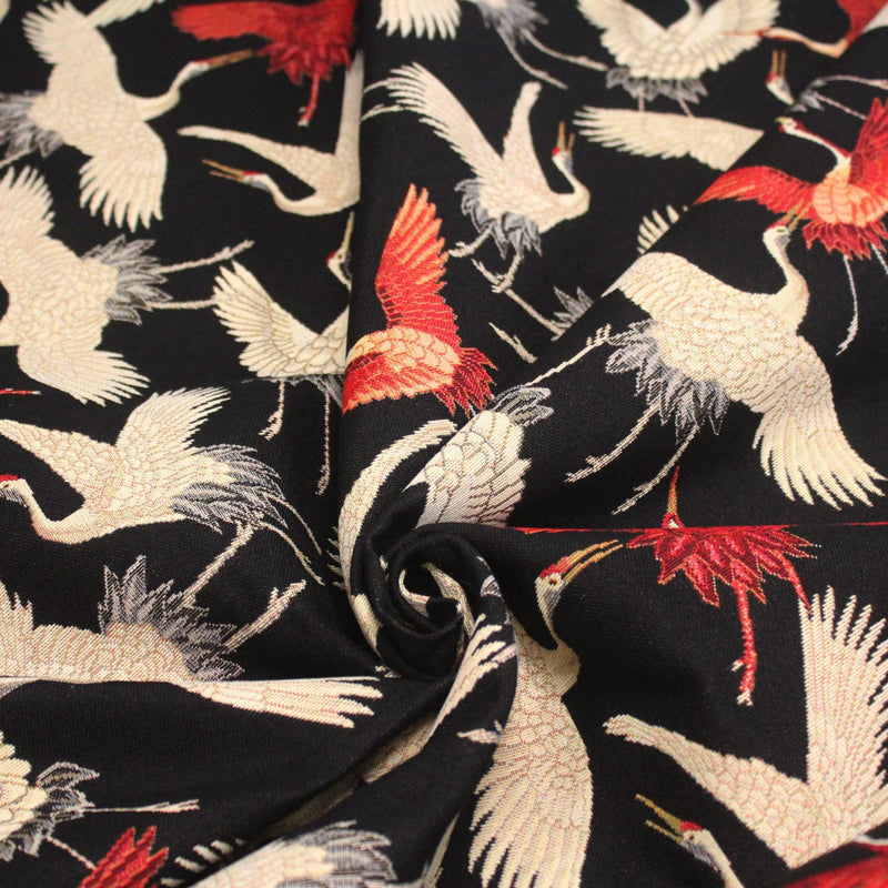 Tissu jacquard motif traditionnel japonais des grues tsuru écrues & rouges, fond noir - Oeko - Tex - TissusPapi.com