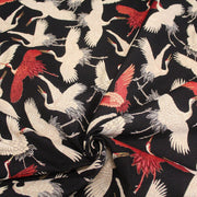 Tissu jacquard motif traditionnel japonais des grues tsuru écrues & rouges, fond noir - Oeko - Tex - TissusPapi.com