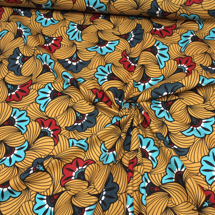Tissu de coton demi-natté motif wax aux grandes fleurs bleues & rouges, fond jaune moutarde - Oeko-Tex - tissuspapi