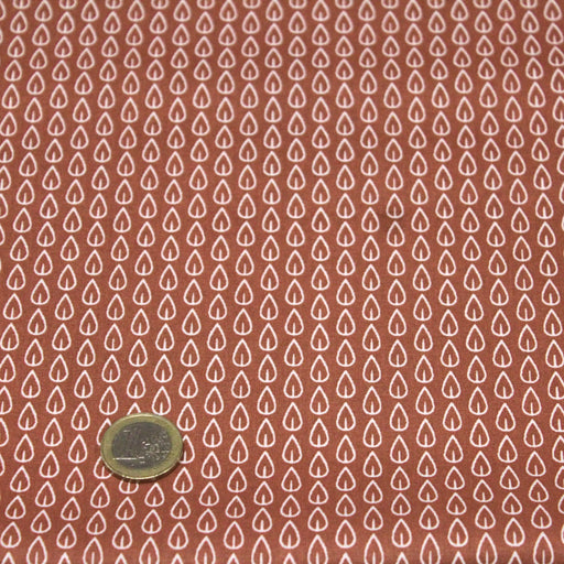 Tissu de coton aux petites feuilles géométriques blanches, fond rouge tomette - OEKO-TEX®