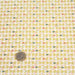 Tissu de coton aux fleurs géométriques jaunes, fond blanc - OEKO-TEX®