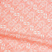 Tissu de coton faux uni motif cachemire orange fluo et blanc