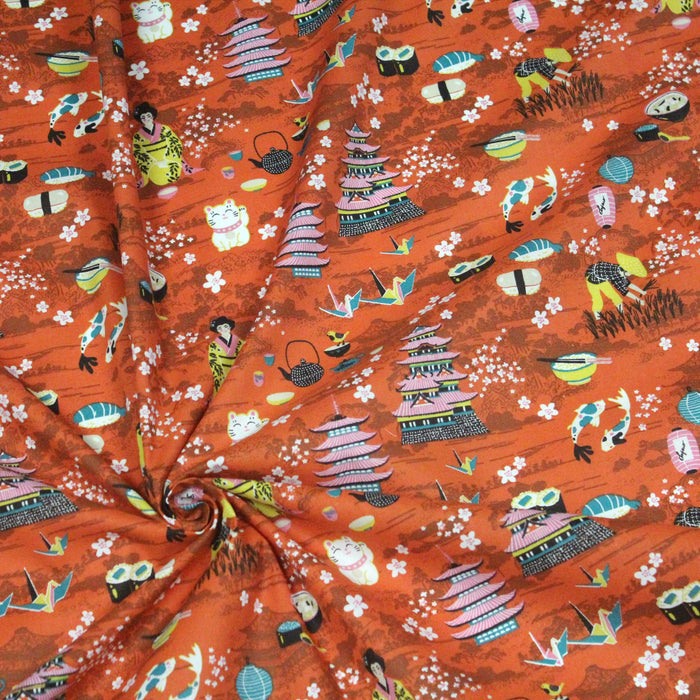 Tissu NAGANO aux motifs japonais, fond orange rouille