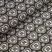 Tissu de coton de Noël scandinave aux cœurs & étoiles de neiges écrus, fond gris - TissusPapi.com