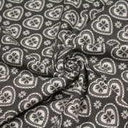 Tissu de coton de Noël scandinave aux cœurs & étoiles de neiges écrus, fond gris - TissusPapi.com