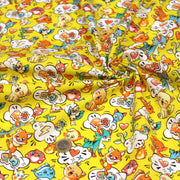 Tissu cotonnade KAWAII aux animaux souriants, fond jaune - OEKO - TEX - TissusPapi.com