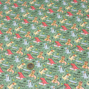 Tissu de coton Dinosaure music lover, fond vert sauge - Oeko - Tex - TissusPapi.com
