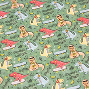 Tissu de coton Dinosaure music lover, fond vert sauge - Oeko - Tex - TissusPapi.com