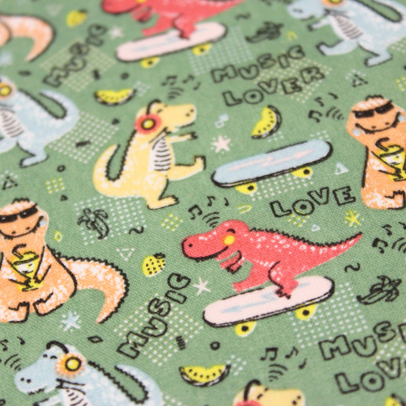 Tissu de coton Dinosaure music lover, fond vert sauge - Oeko - Tex - TissusPapi.com