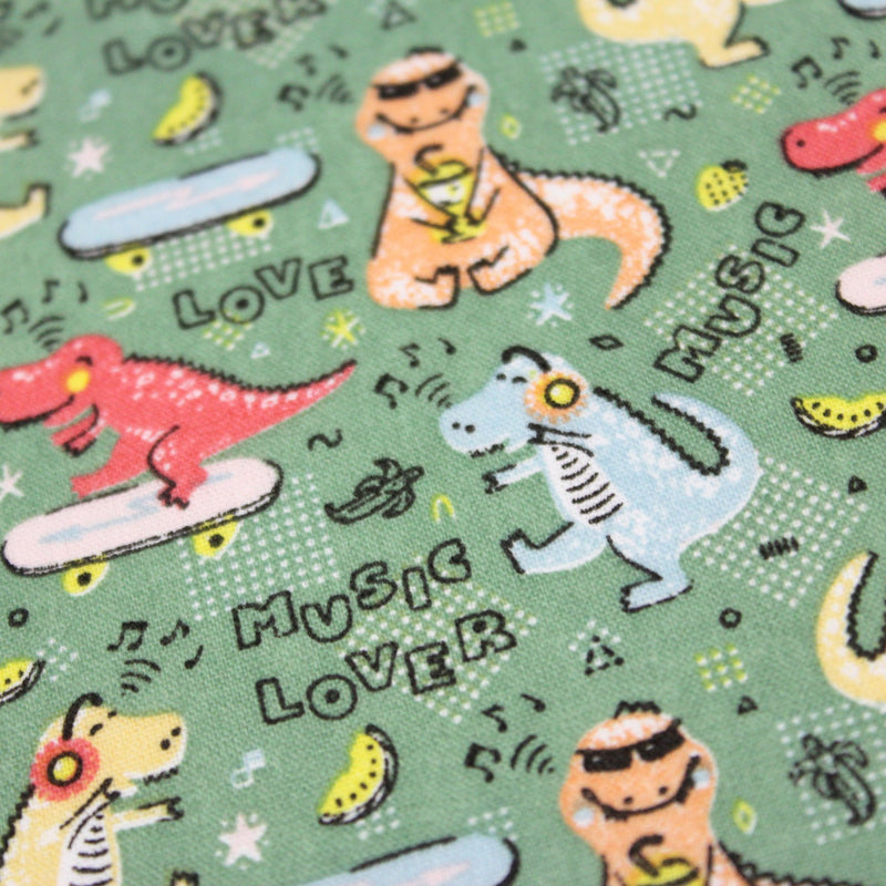 Tissu de coton Dinosaure music lover, fond vert sauge - Oeko - Tex - TissusPapi.com