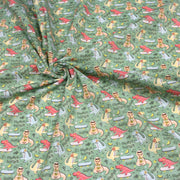 Tissu de coton Dinosaure music lover, fond vert sauge - Oeko - Tex - TissusPapi.com