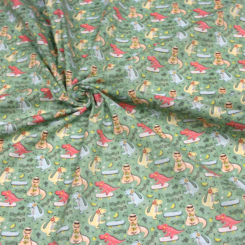 Tissu de coton Dinosaure music lover, fond vert sauge - Oeko - Tex - TissusPapi.com