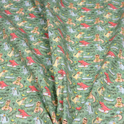Tissu de coton Dinosaure music lover, fond vert sauge - Oeko - Tex - TissusPapi.com