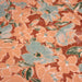Tissu Jersey de viscose orange rouille aux fleurs vert amande & corail