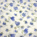 Tissu froissé polyester écru aux fleurs bleues - tissuspapi