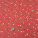 Tissu de coton rouge aux tâches jaunes blanches et vertes - OEKO-TEX® - tissuspapi