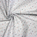 Tissu de coton aux pissenlits roses et blancs , fond gris clair - OEKO-TEX® - tissuspapi