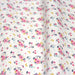 Tissu de coton blanc aux fines fleurs roses et pois bleu marine - OEKO-TEX® - tissuspapi