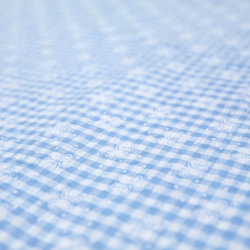 Tissu de coton Seersucker Vichy à carreaux bleu ciel et blancs 3mm et fines fleurs blanches - tissuspapi
