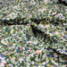 Tissu Microfibre de viscose vert kaki aux fines fleurs blanches jaunes roses et bleues - OEKO-TEX® - tissuspapi