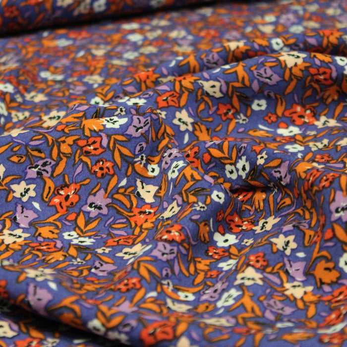 Tissu Microfibre de viscose violet, aux fleurs oranges, rouilles et écrues - OEKO-TEX® - tissuspapi