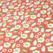 Tissu popeline de coton orange aux petites fleurs blanches et vertes - tissuspapi