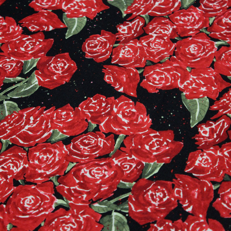 Tissu popeline de coton aux fleurs de roses rouges fond noir - TissusPapi.com