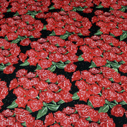 Tissu popeline de coton aux fleurs de roses rouges fond noir - TissusPapi.com