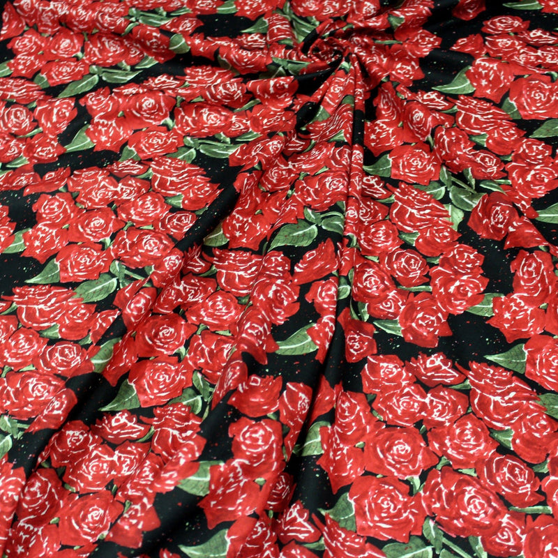 Tissu popeline de coton aux fleurs de roses rouges fond noir - TissusPapi.com